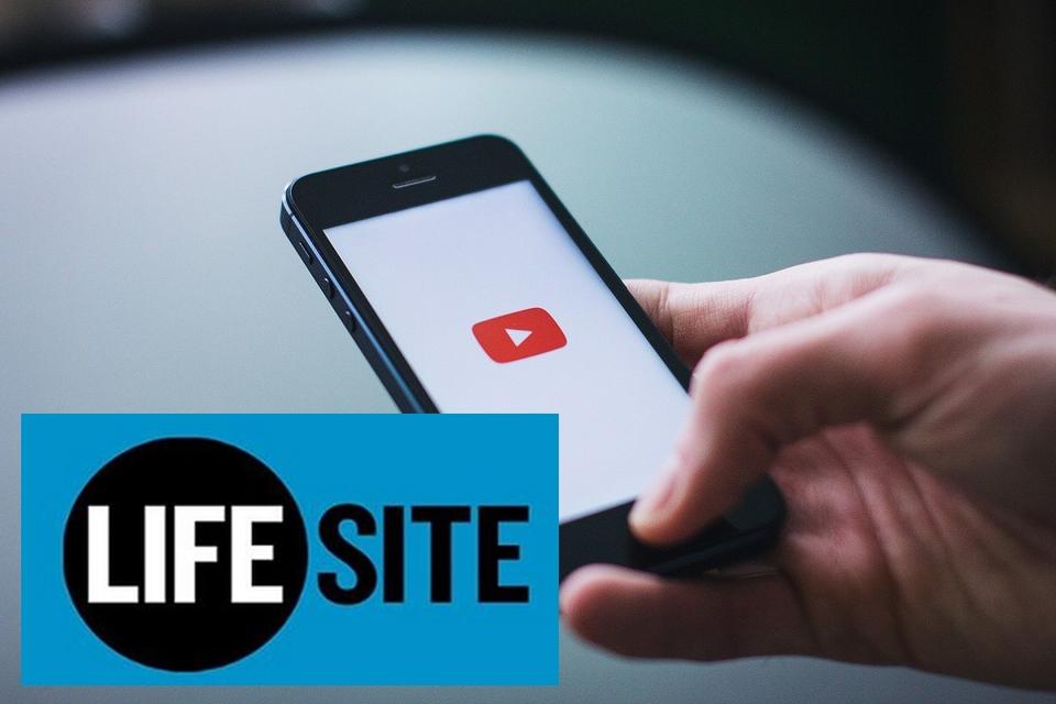 YouTube w telefonie komórkowym i logo Life Site.